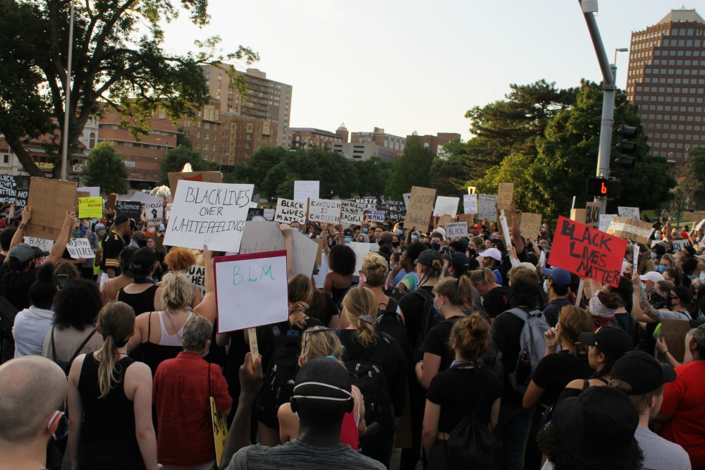 Protesters against systemic racism gather in the street on the Country Club Plaza in Kansas City, Missouri, June 3. (NCR photo/Brian Roewe) Protesters against systemic racism gather in the street on the Country Club Plaza in Kansas City, Missouri, June 3. (NCR photo/Brian Roewe)