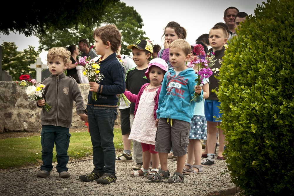 Schoolchildren in Graignes, France, wait to place flowers on a memorial during a ceremony on June 5, 2015, honoring those who died during the Battle of Graignes in 1944. (Wikimedia Commons/U.S. Army/Capt. Saska Ball) Schoolchildren in Graignes, France, wait to place flowers on a memorial during a ceremony on June 5, 2015, honoring those who died during the Battle of Graignes in 1944. (Wikimedia Commons/U.S. Army/Capt. Saska Ball)