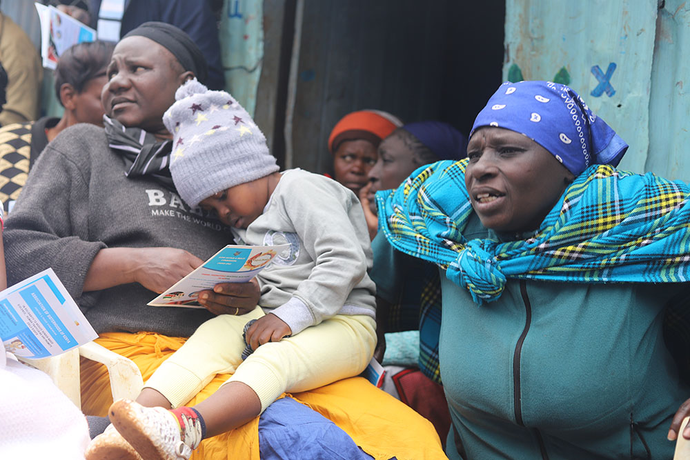 Residents of Kawangware, a low-income residential area in Nairobi, attend the sisters' education and peace campaign sessions on July 22. Religious sisters are carrying out civic education across the country.