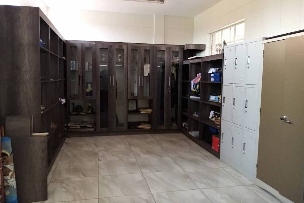 Room with lockers and closets