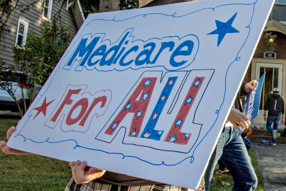 A "Medicare for All" sign is seen in Westerville, Ohio, Oct. 15, the day of the Democratic primary debate at Otterbein University. (Flickr/Becker1999) A "Medicare for All" sign is seen in Westerville, Ohio, Oct. 15, the day of the Democratic primary debate at Otterbein University. (Flickr/Becker1999)