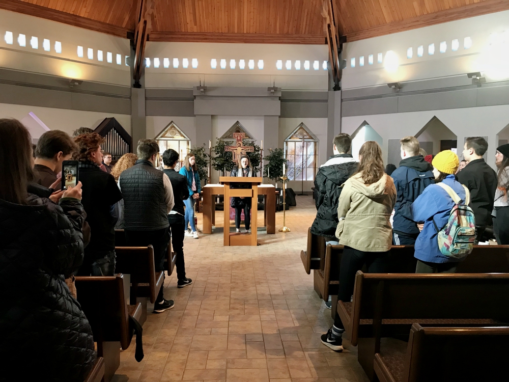 A prayer service is held at St. Ignatius High School before Cleveland's March for Our Lives March 24. (Christine Schenk)