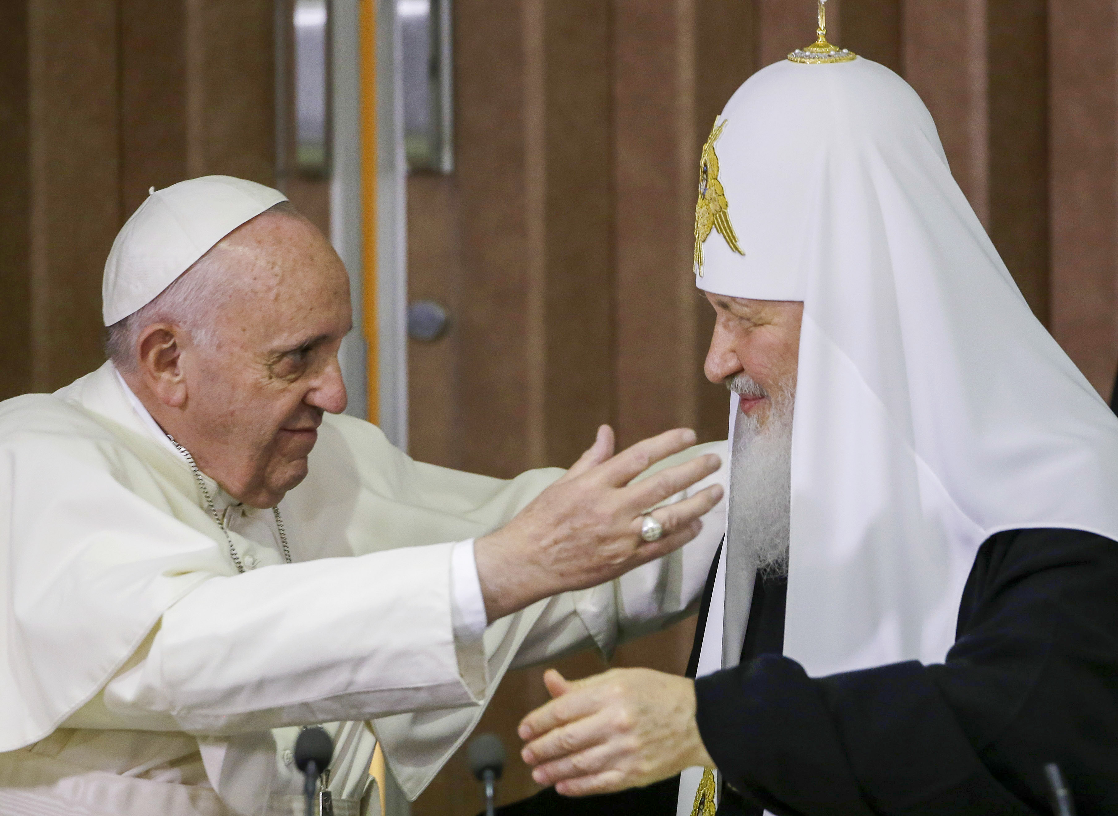 Pope Francis, left, reaches to embrace Russian Orthodox Patriarch Kirill in Havana, Cuba Feb. 12, 2016. (AP Photo/Gregorio Borgia, Pool) Pope Francis, left, reaches to embrace Russian Orthodox Patriarch Kirill in Havana, Cuba Feb. 12, 2016. (AP Photo/Gregorio Borgia, Pool)