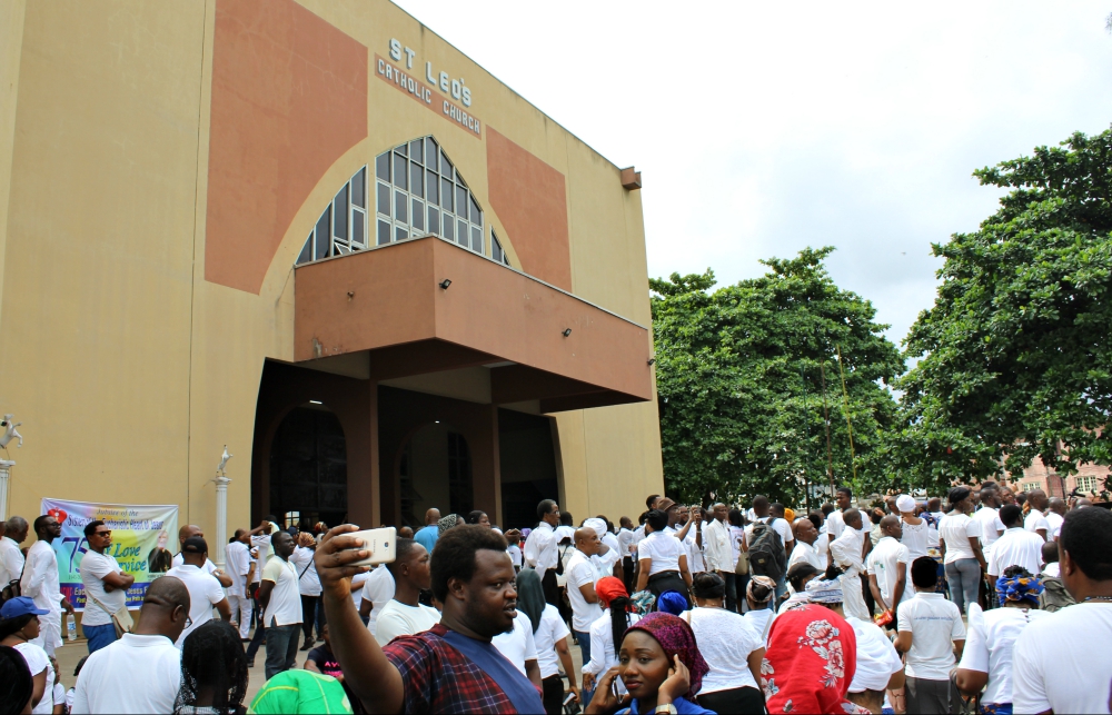 Scores of Catholics stayed outside during the requiem Mass May 22 at St. Leo's Catholic Church in Ikeja, Nigeria, because the 6,000 seats in the church were already taken. (Festus Iyorah) Scores of Catholics stayed outside during the requiem Mass May 22 at St. Leo's Catholic Church in Ikeja, Nigeria, because the 6,000 seats in the church were already taken. (Festus Iyorah)