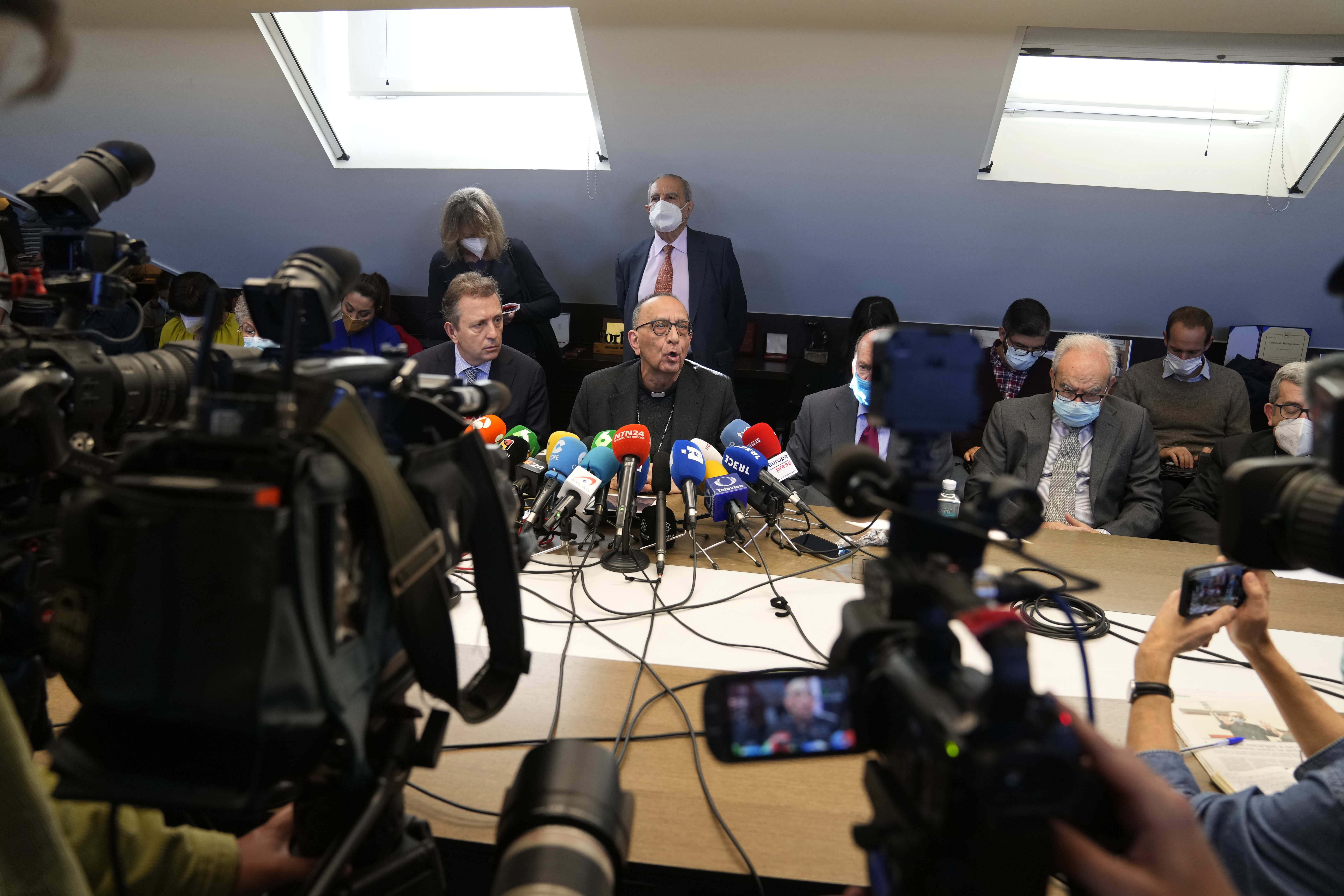 Cardenal Juan Jose Omella, center, speaks during a press conference in Madrid, Spain, Tuesday, Feb. 22, 2022. (AP Photo/Paul White) Cardenal Juan Jose Omella, center, speaks during a press conference in Madrid, Spain, Tuesday, Feb. 22, 2022. (AP Photo/Paul White)