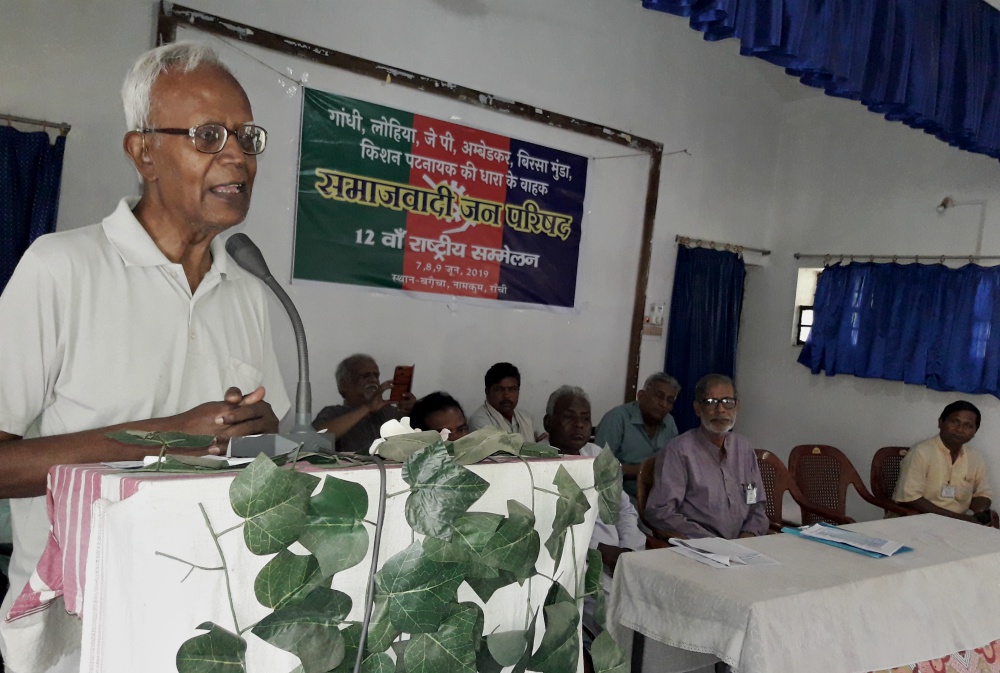 Jesuit Fr. Stan Swamy speaks at a national seminar on social reformers in June 2019 in Bagaicha, India. (Dan Solomon)