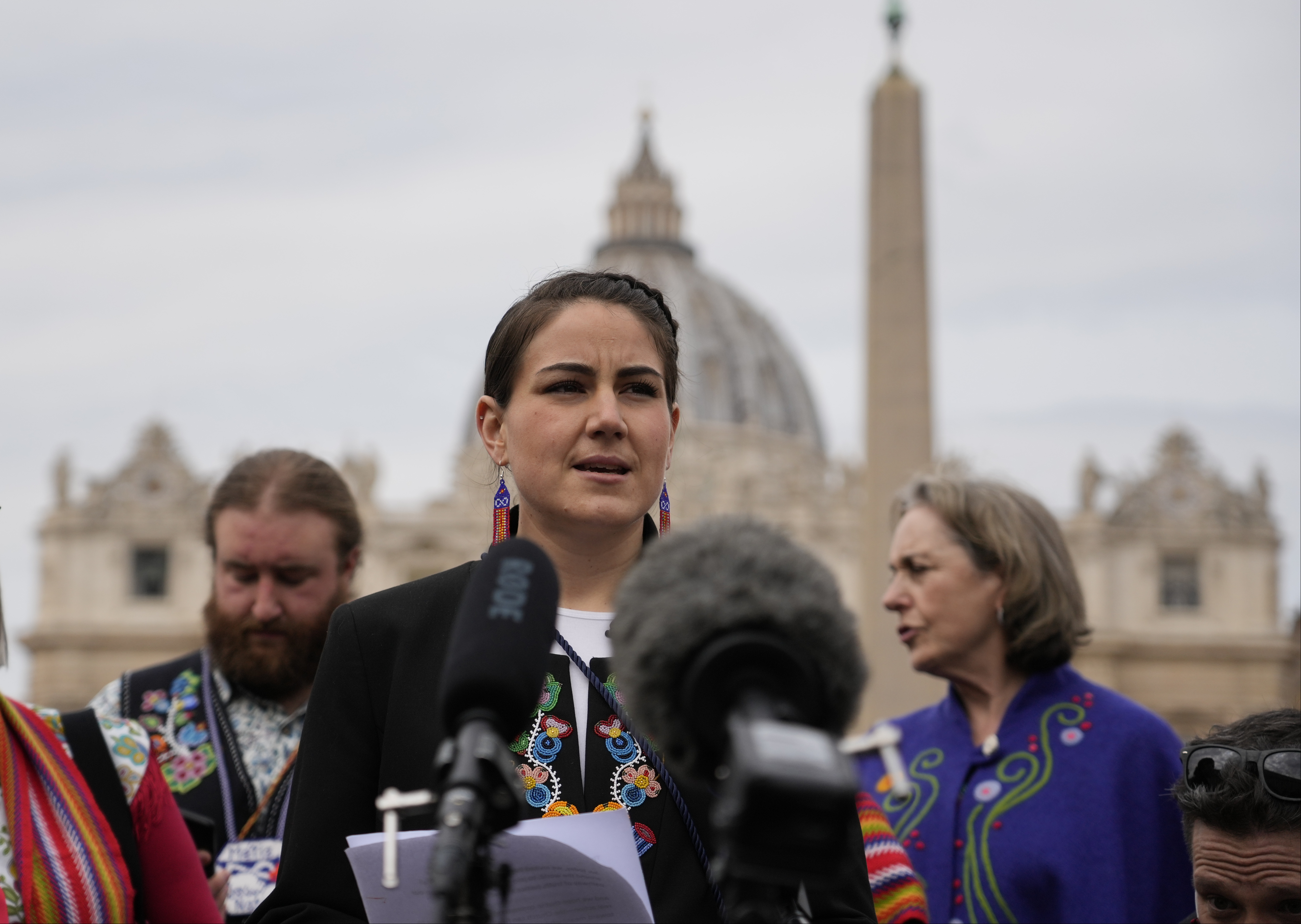President of the Metis community, Cassidy Caron, speaks to the media in St. Peter's Square after their meeting with Pope Francis at The Vatican, Monday, March 28, 2022. (AP Photo/Gregorio Borgia) President of the Metis community, Cassidy Caron, speaks to the media in St. Peter's Square after their meeting with Pope Francis at The Vatican, Monday, March 28, 2022. (AP Photo/Gregorio Borgia)