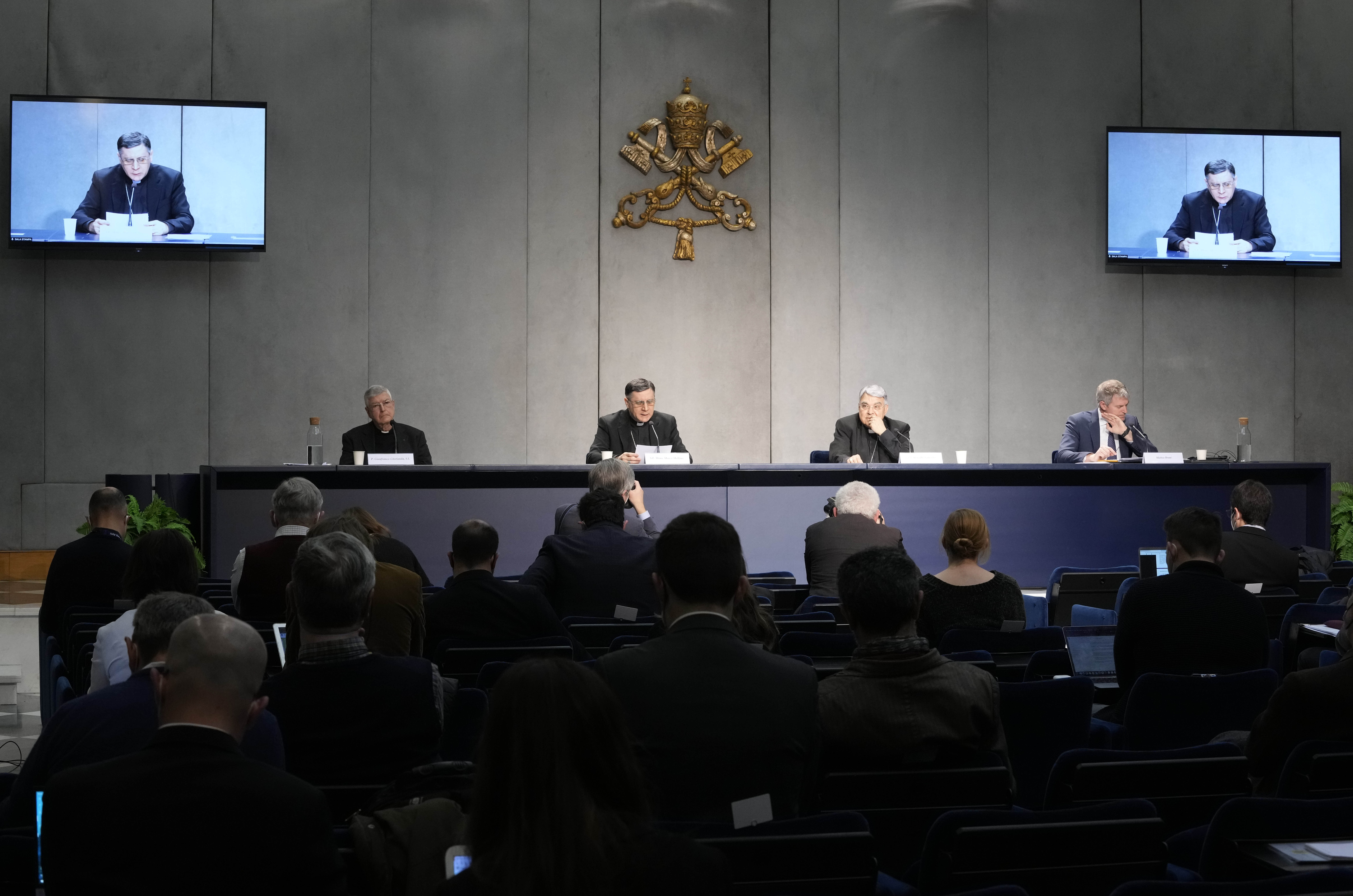 From left, Professor Gianfranco Ghirlanda, Mons. Marco Mellino, Cardinal Marcello Semeraro, and Vatican's spokesman Matteo Bruni, attend the presentation of the long-awaited reform program of the Holy See bureaucracy, during a press conference at the Vati From left, Professor Gianfranco Ghirlanda, Mons. Marco Mellino, Cardinal Marcello Semeraro, and Vatican's spokesman Matteo Bruni, attend the presentation of the long-awaited reform program of the Holy See bureaucracy, during a press conference at the Vati