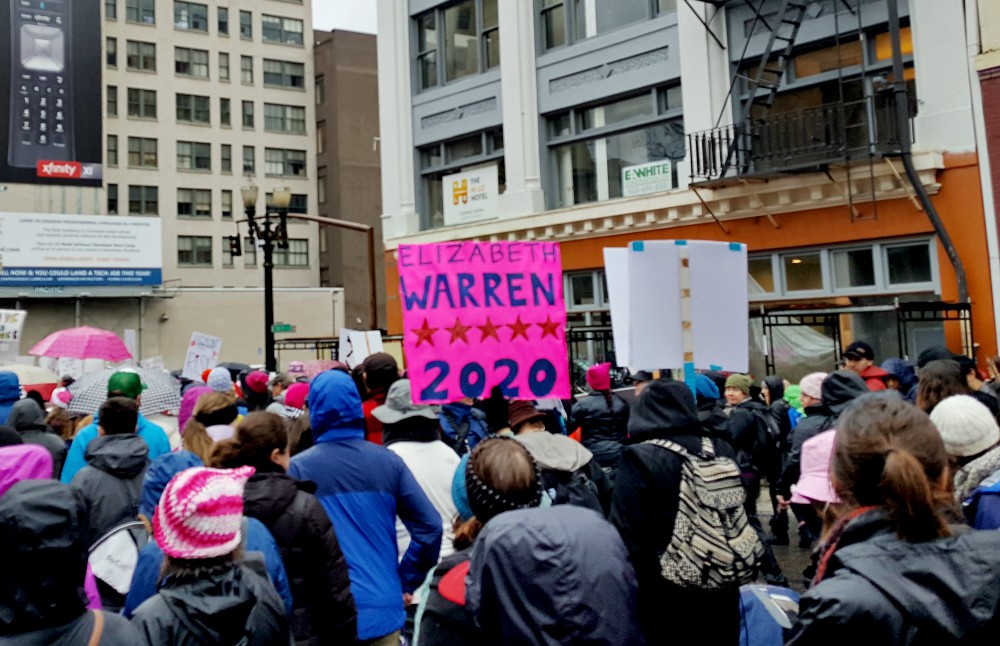 A sign supporting a 2020 presidential run for Massachusetts Sen. Elizabeth Warren is seen during the Women's March in Portland, Oregon, on Jan. 21, 2017. (Wikimedia Commons/Another Believer) A sign supporting a 2020 presidential run for Massachusetts Sen. Elizabeth Warren is seen during the Women's March in Portland, Oregon, on Jan. 21, 2017. (Wikimedia Commons/Another Believer)