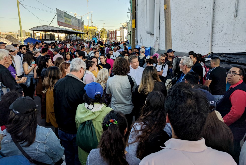 Catholic activists gather at the U.S.-Mexico border in El Paso, Texas, in a demonstration supporting immigrants Oct. 12, 2019. (Courtesy of Eli McCarthy)