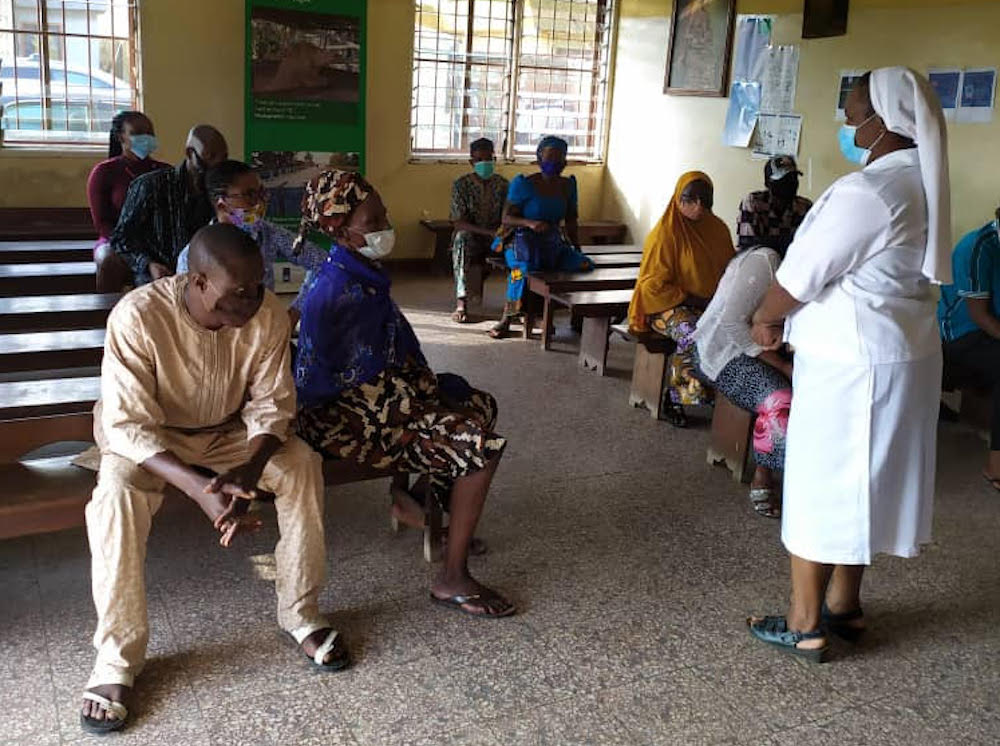 Notre Dame de Namur Sr. Prisca Igbozulike holds a COVID-19 awareness workshop for her patients at St. Catherine of Siena Medical Centre in Lagos, Nigeria. (Patrick Egwu)