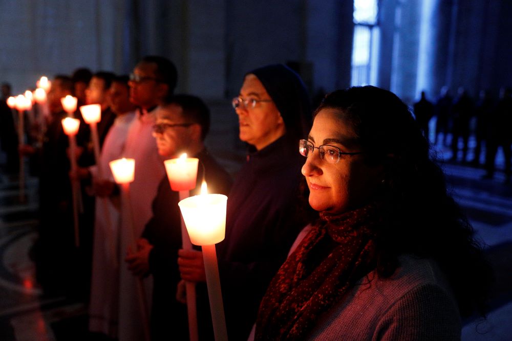 Religious hold candles as Pope Francis celebrates Mass on Feb. 2, 2017, to mark the feast of the Presentation of the Lord in St. Peter's Basilica at the Vatican. In a video message released by the pope's Worldwide Prayer Network on Feb. 1.