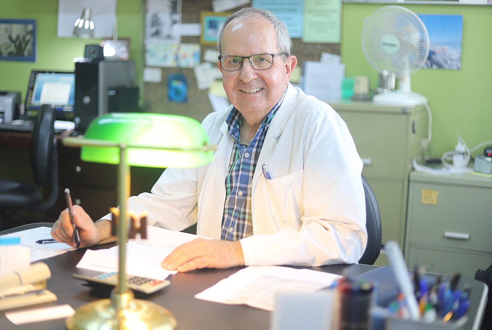 Dr. William Fryda, an American former Maryknoll priest, sits in his office at St. Joseph Hospital June 2 in Gilgil. Fryda has set up another hospital next to the St Mary's Mission Hospital Elementaita to continue with his mission of serving the poor after