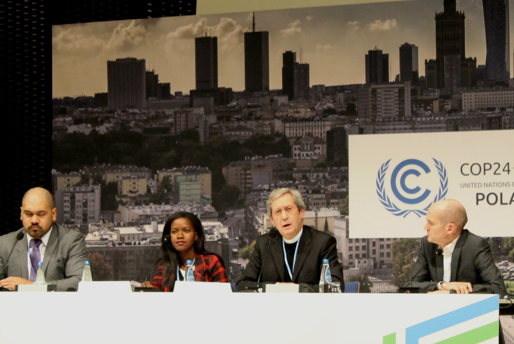 Msgr. Bruno-Marie Duffé, second from right, speaks at a press conference Dec. 12 in Katowice, Poland. With him are, from left, Joseph Sapati Moeono-Kolio, Mercy Chirambo and Neil Thorns. (NCR photo/Brian Roewe)