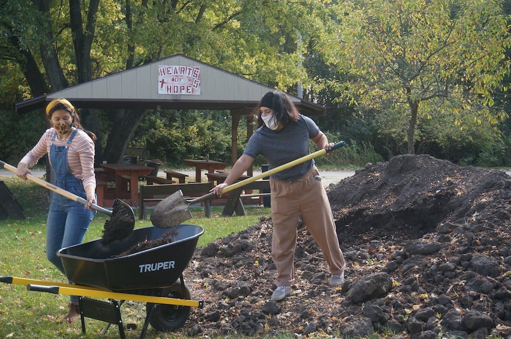 Two women work on a garden at Sacred Heart Parish Mission in the Diocese of Joliet, Illinois. The food grown will be distributed to people in need of food assistance. (CNS photo/courtesy Diocese of Joliet)