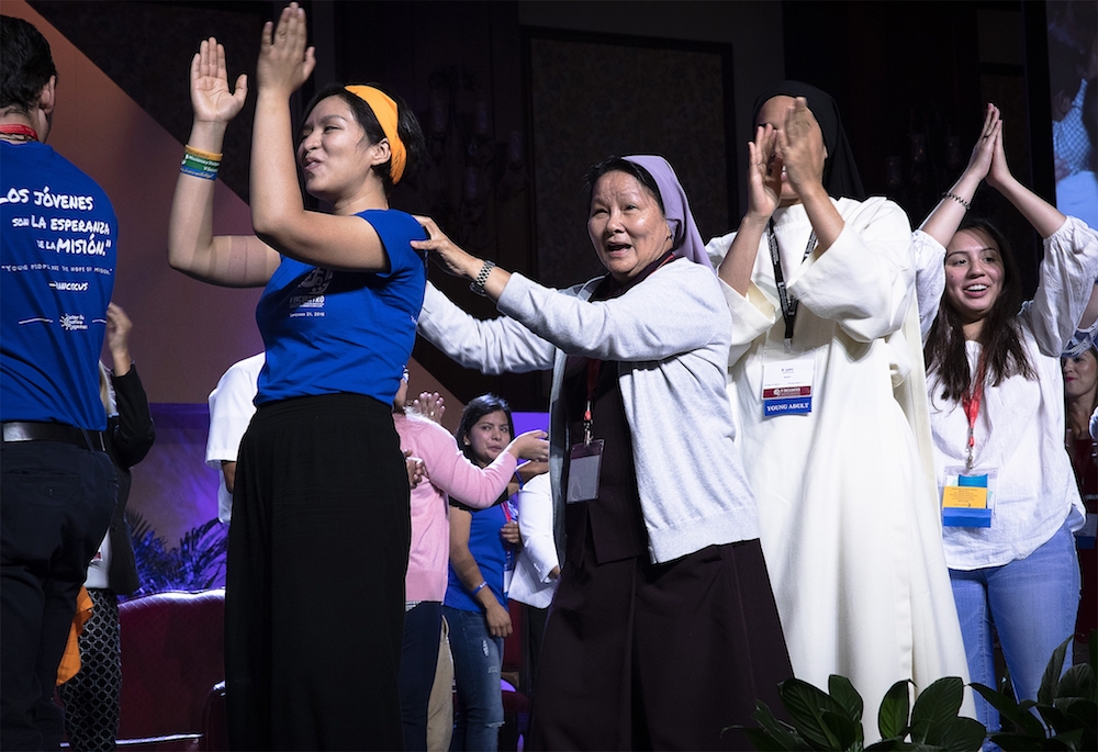 Delegates celebrate at the closing session of a gathering of Hispanic Catholics in Texas in September. Among Americans ages 18-29, 9% are Hispanic Catholics, while 8% are white Catholics. (CNS photo/Tyler Orsburn)