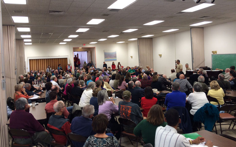 Parishioners gather Jan. 19 at Aquinas Newman Center in Albuquerque, N.M., to discuss the center's impending leadership change. (J.D. Wellborn)