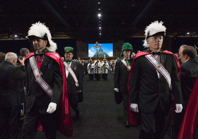 Members of the Knights of Columbus process during Mass Aug. 4 at their annual convention in Philadelphia. Approximately 2,000 knights from around the country and abroad gathered at the Pennsylvania Convention Center for the Catholic fraternal organization's 133rd Supreme Convention. (CNS photo/Matthew Barrick, Knights of Columbus)