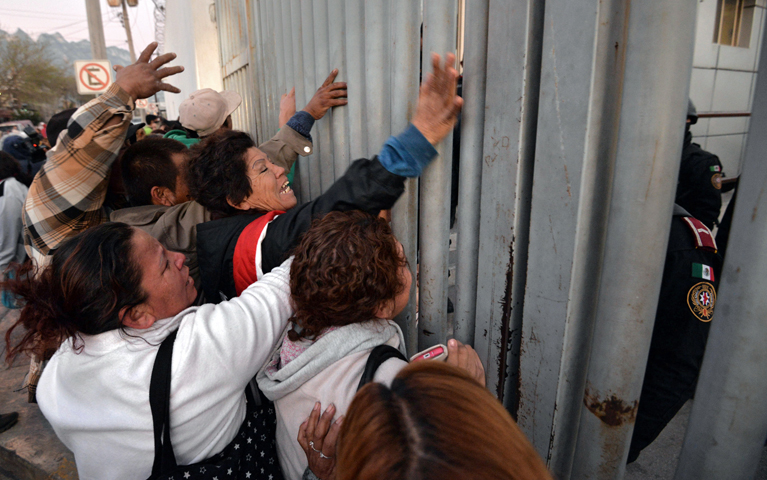 Relatives of prisoners demand information about the Feb. 11 riot at the Topo Chico prison in Monterrey, Mexico. (CNS/Miguel Sierra, EPA)