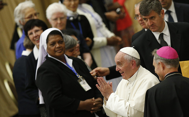 Pope Francis gestures during an audience with the heads of women's religious orders in Paul VI hall at the Vatican May 12. (CNS/Paul Haring)