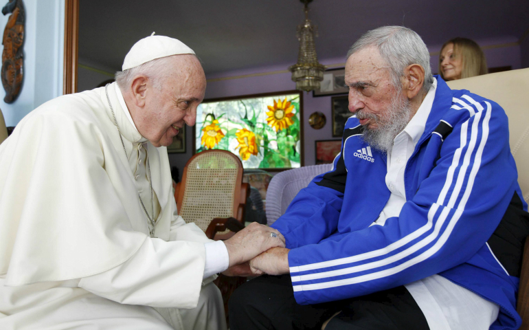 Pope Francis and former Cuban President Fidel Castro grasp each other's hands at Castro's residence in Havana Sept. 20, 2015. Castro, who seized power in a 1959 revolution and governed Cuba until 2006, died Nov. 25 at the age of 90. (CNS photo/Alex Castro, AIN handout via Reuters)