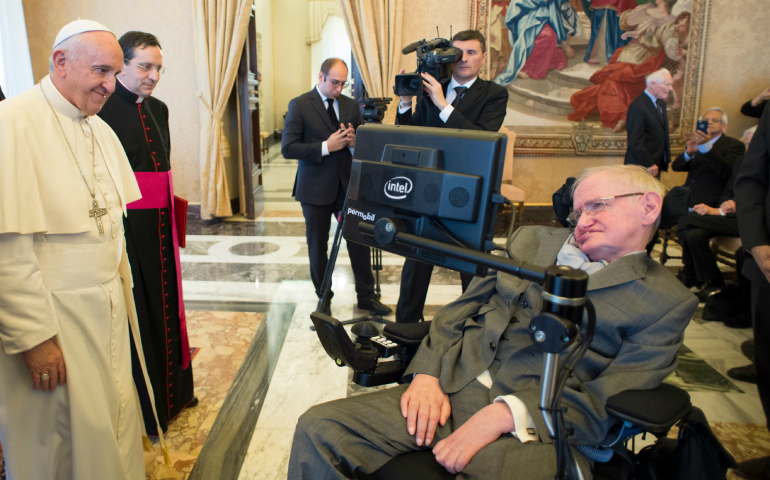 Pope Francis greets British theoretical physicist and cosmologist Stephen Hawking, during an audience with participants attending a plenary session of the Pontifical Academy of Sciences at the Vatican Nov. 28. (CNS photo/L'Osservatore Romano, handout)