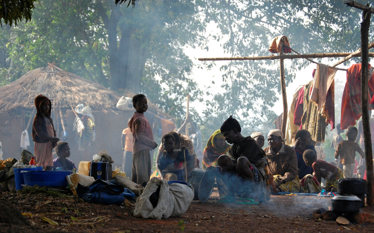 Displaced people are seen outside their shelters in the Congolese village of Karukwat. Catholic bishops in Congo have warned of chaos if government and opposition leaders fail to agree to a timeline for elections and reiterated their commitment to help arrange a compromise. (CNS photo/Aaron Ross, Reuters)