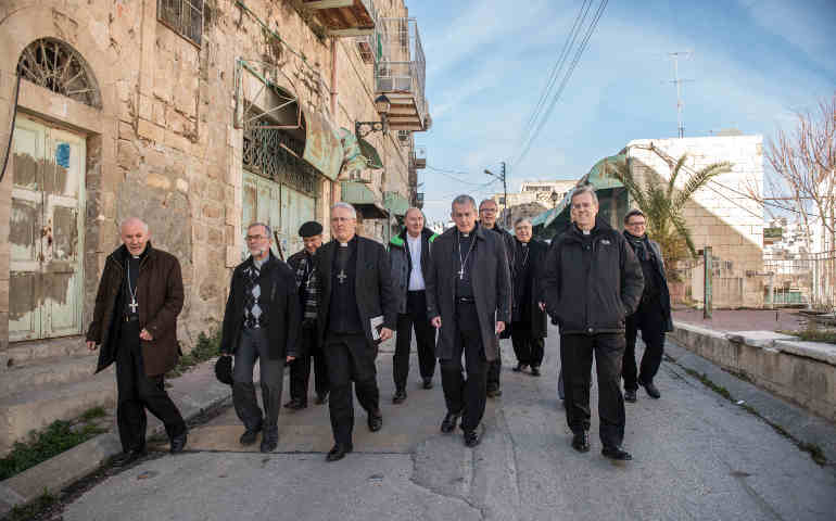 Bishops from the U.S, Canada and Europe walk in Hebron, West Bank, Jan. 16. (CNS/Marcin Mazur)