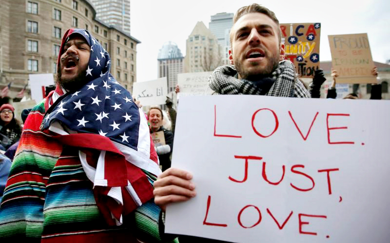 Demonstrators in Boston protest the travel ban imposed by President Donald Trump Jan. 29. (CNS/Reuters/Brian Snyder)