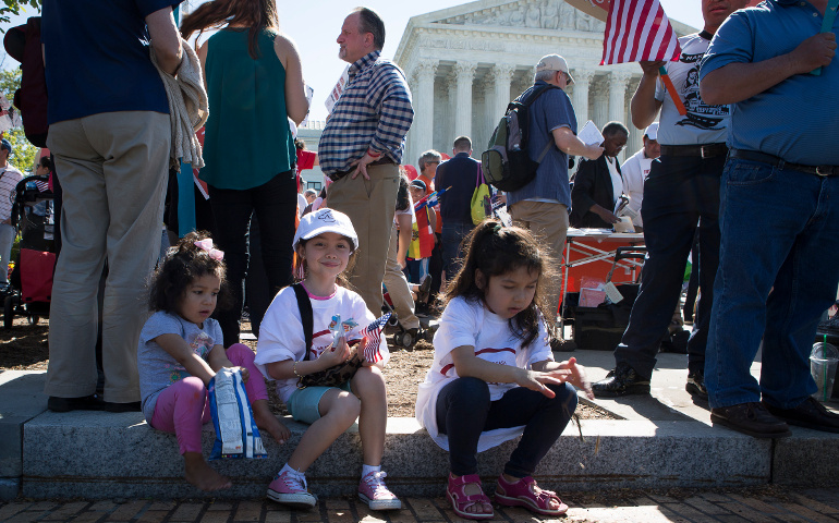 An immigration rally takes place April 18 outside the U.S. Supreme Court in Washington. (CNS/Tyler Orsburn)