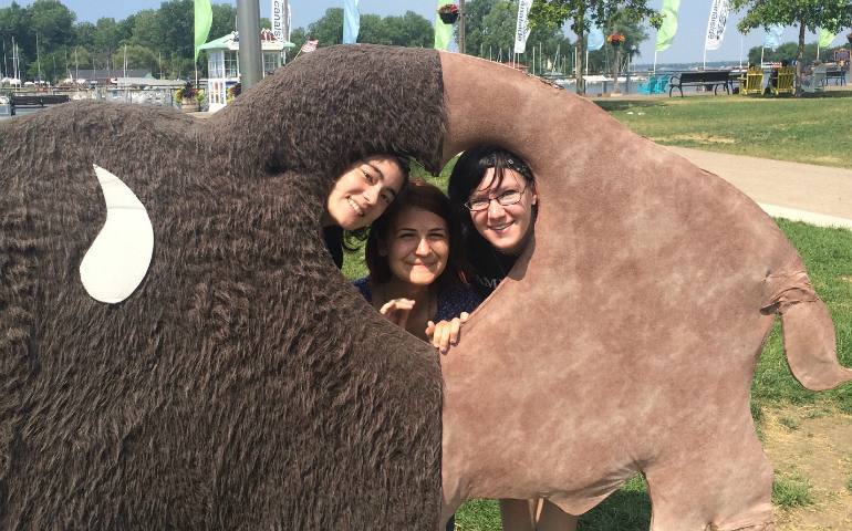 Posing in Buffalo: Be the Light Youth Theology Institute participants Nicole Masaki, Canisius student, class of 2018, Monica Wrobel, Canisius student, class of 2017, and Sandra Stahl, Orchard Park High School. (Caleb Blodgett)