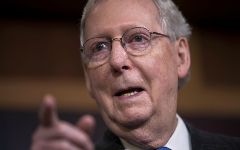 U.S. Senate Majority Leader Mitch McConnell speaks to the media April 7. (CNS photo/Jim Lo Scalzo, EPA)