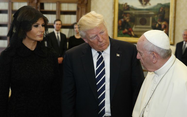 Pope Francis talks with U.S. President Donald Trump as they exchange gifts during a private audience at the Vatican May 24. (CNS photo/Paul Haring)