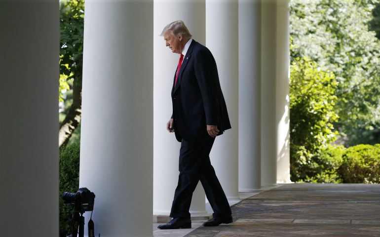 President Donald Trump enters the Rose Garden at the White House to announce his decision to leave the Paris climate agreement June 1. (CNS phot/Joshua Roberts, Reuters)