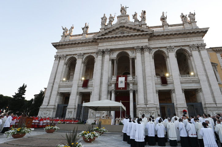 Pope Francis celebrates Mass Thursday outside Rome's Basilica of St. John Lateran on the feast of Corpus Christi. (CNS/Paul Haring)