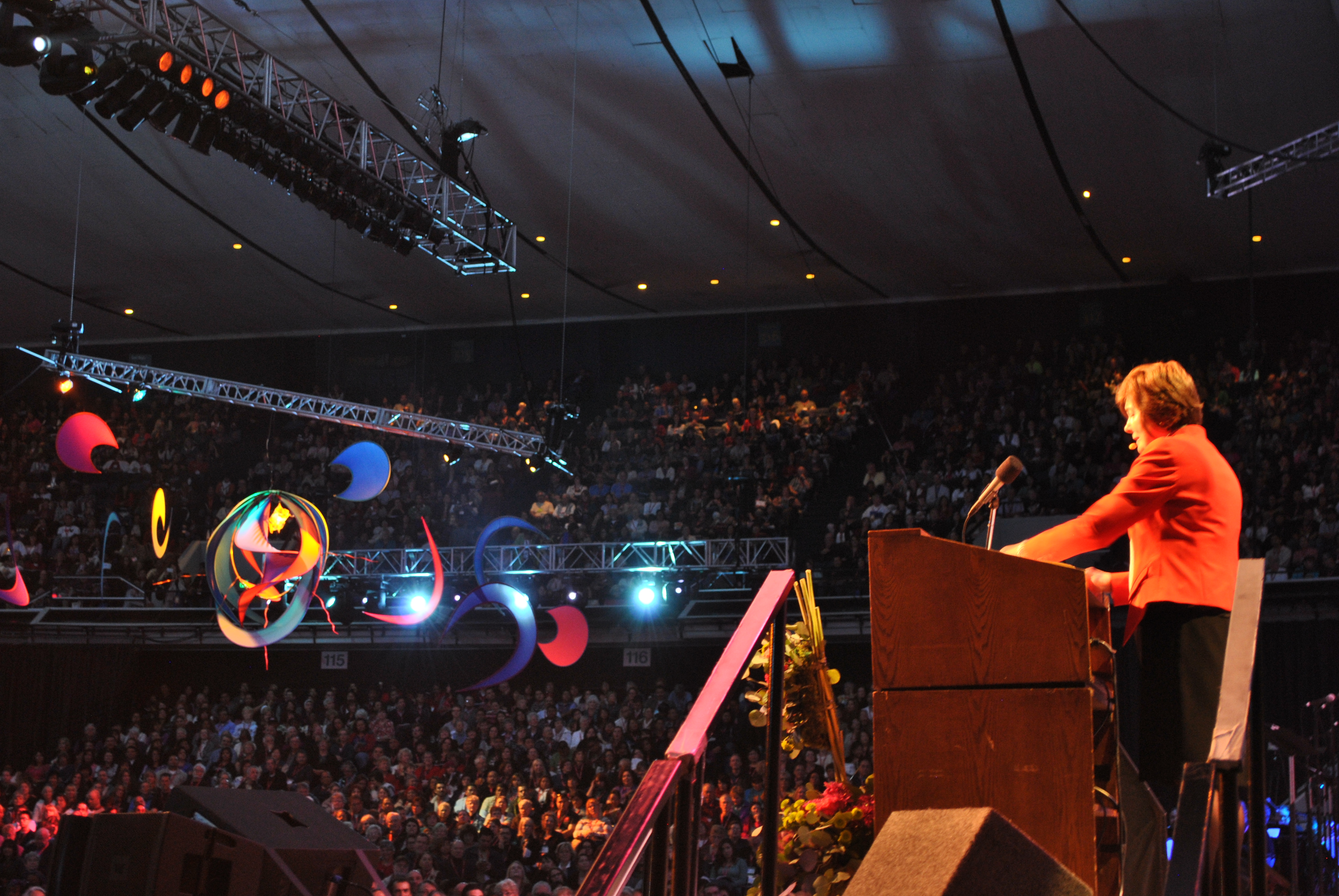 Sr. Edith Prendergast speaks to a full crowd in the arena