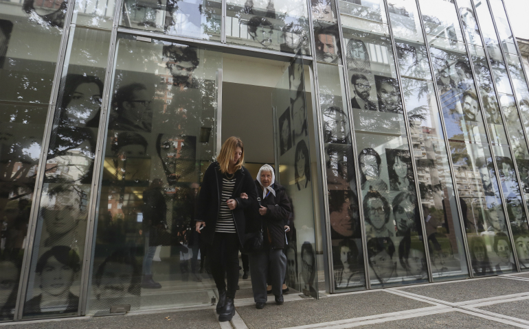 A representative of the organization Mothers of the Plaza de Mayo, right, attends an event at the Ex-ESMA Memorial in Buenos Aires, Argentina, May 19, 2016. The biggest torture center during the last Argentinian dictatorship (1976-1983) has been signaled and protected with the United Nations' Blue Shield. (Newscom/David Fernandez, EFE)