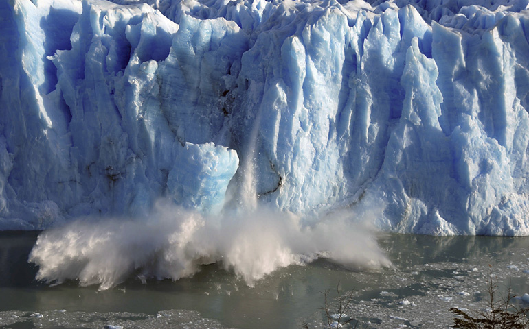 Splinters of ice peel off from one of the sides of the Perito Moreno glacier during the Southern Hemisphere's winter months in early July 2008 near El Calafate, Argentina. (CNS photo/Andres Forza, Reuters)