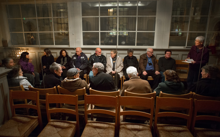 Charity Sr. Cathy Cahur, standing at right, leads the centering prayer group at Most Holy Redeemer. (Dennis Callahan)