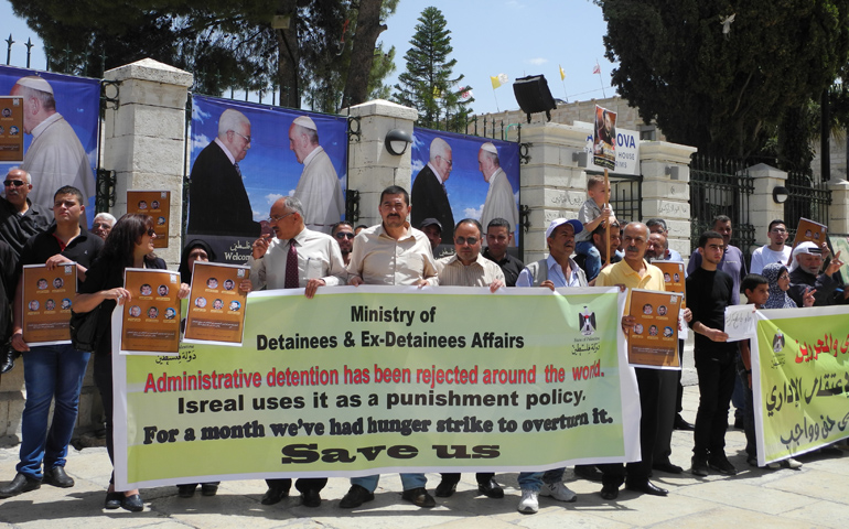 People protest Thursday in Manger Square, Bethlehem, demanding the return of Palestinians detained in Israeli prisons. Family members of those detained were among the group of about 50 protestors. (Melanie Lidman)