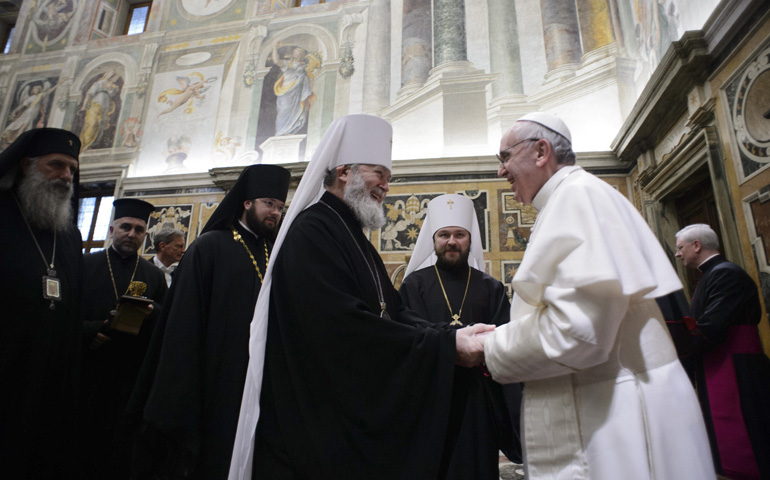 Pope Francis greets religious leaders Wednesday during a meeting at the Vatican. (CNS/Reuters/L'Osservatore Romano)