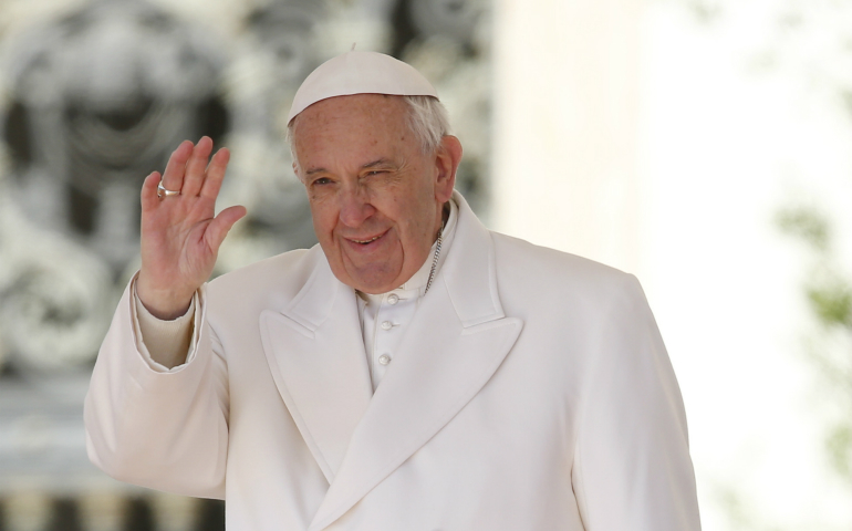 Pope Francis greets the crowd during his general audience in St. Peter's Square at the Vatican April 19. (CNS photo/Paul Haring)