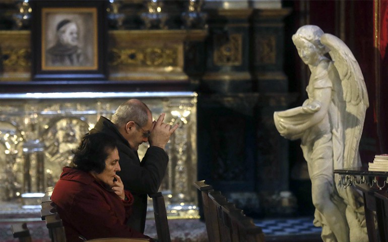Faithful pray in St. John Cathedral in downtown Valletta, Malta, on Feb. 2, 2017. (Gregorio Borgia/AP)