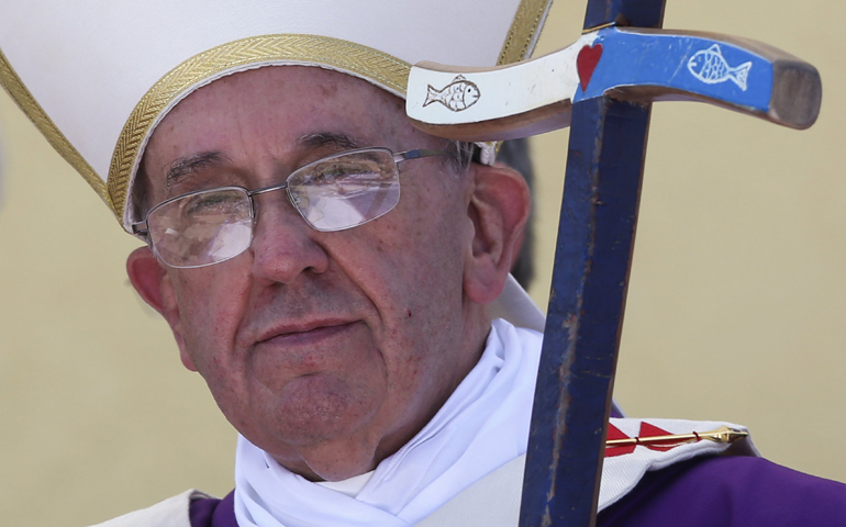 Pope Francis celebrates Mass during his visit to Lampedusa, Italy, July 8. (Newscom/Reuters/Alessandro Bianchi)