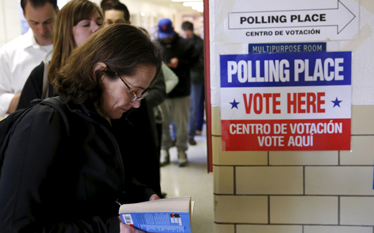 Voters line up early to cast their ballots in Super Tuesday elections at the Wilson School in Arlington, Va., on March 1, 2016. (Reuters/Gary Cameron)