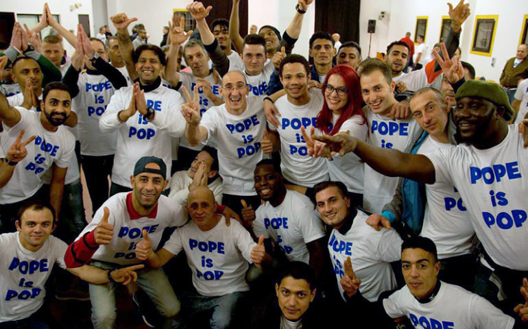 Prisoners and organizers at the Ferrara District Prison pose for photos while preparing the “Pope is Pop” flash mob routine in Ferrara in northern Italy. (RNS/Tommaso Trombetta)