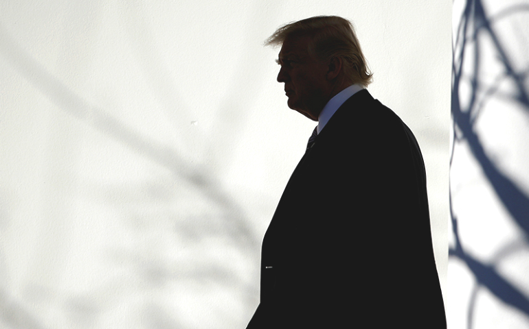 President Trump walks through the colonnade to the Oval Office after returning to the White House in Washington on Jan. 26, 2017. (Reuters/Joshua Roberts)