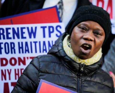A woman participates in an immigration rally for Haitians Nov. 21, 2017, in New York. The previous day, Trump administration had announced that Haitians with temporary protected status must leave the country by July 22, 2019. (CNS/Reuters/Eduardo Munoz) A woman participates in an immigration rally for Haitians Nov. 21, 2017, in New York. The previous day, Trump administration had announced that Haitians with temporary protected status must leave the country by July 22, 2019. (CNS/Reuters/Eduardo Munoz)