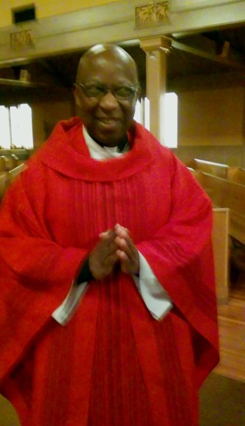 Fr. George Kuforiji smiles during a Tuesday noon Mass at St. Francis of Assisi Church in Portland, Oregon. (Peter Feuerherd)