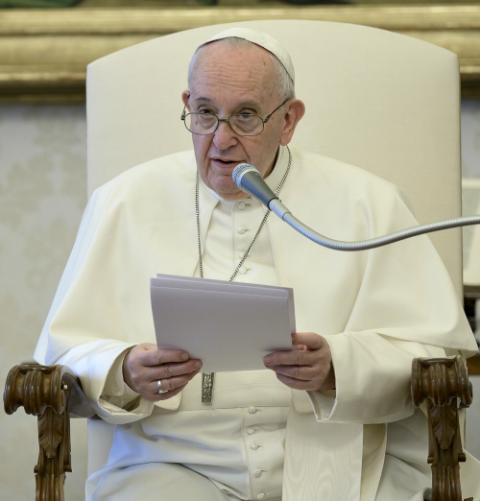 Pope Francis holds his weekly general audience April 22, 2020, in the papal library in the Apostolic Palace. Marking the celebration of Earth Day, the pope urged people to protect the Earth and its inhabitants. (CNS/Vatican Media)